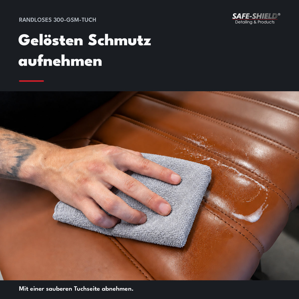 A grey edgeless microfibre cloth lifts loosened dirt and cleaning foam from the brown leather seat.